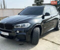 Черный БМВ Х5, объемом двигателя 3 л и пробегом 73 тыс. км за 43000 $, фото 1 на Automoto.ua