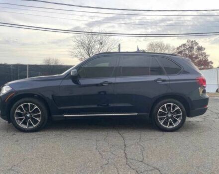 Чорний БМВ Х5, об'ємом двигуна 3 л та пробігом 58 тис. км за 21600 $, фото 4 на Automoto.ua