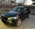 Черный БМВ Х5, объемом двигателя 3 л и пробегом 112 тыс. км за 15900 $, фото 1 на Automoto.ua