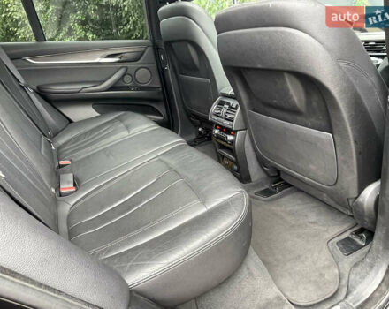 Черный БМВ Х5, объемом двигателя 3 л и пробегом 126 тыс. км за 32000 $, фото 24 на Automoto.ua