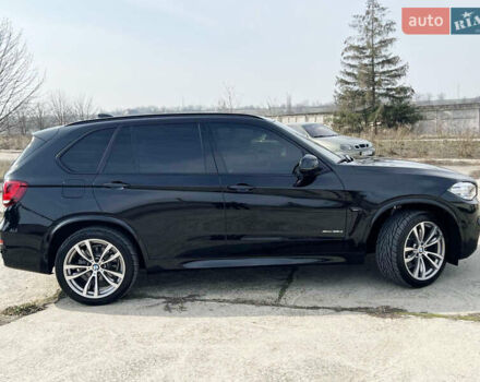 Черный БМВ Х5, объемом двигателя 3 л и пробегом 73 тыс. км за 43000 $, фото 4 на Automoto.ua