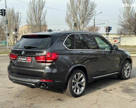 Чорний БМВ Х5, об'ємом двигуна 3 л та пробігом 110 тис. км за 28490 $, фото 4 на Automoto.ua