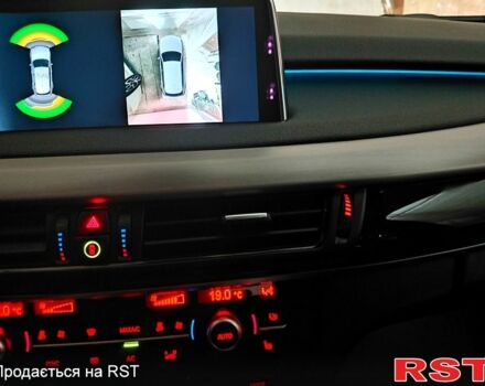 Черный БМВ Х5, объемом двигателя 3 л и пробегом 221 тыс. км за 26000 $, фото 6 на Automoto.ua