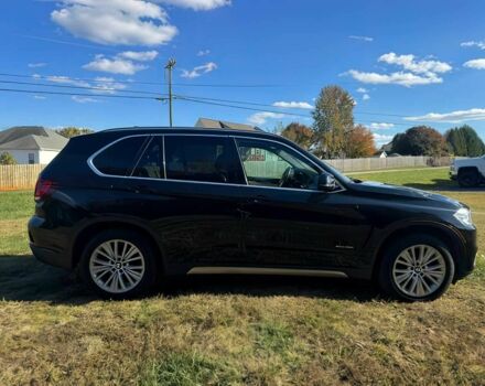 Чорний БМВ Х5, об'ємом двигуна 3 л та пробігом 64 тис. км за 17000 $, фото 7 на Automoto.ua