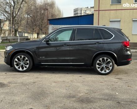 Чорний БМВ Х5, об'ємом двигуна 3 л та пробігом 110 тис. км за 28490 $, фото 1 на Automoto.ua