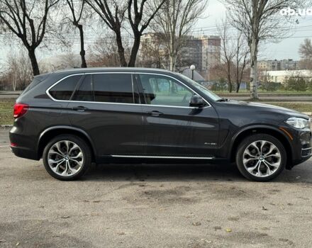 Чорний БМВ Х5, об'ємом двигуна 3 л та пробігом 110 тис. км за 28490 $, фото 5 на Automoto.ua