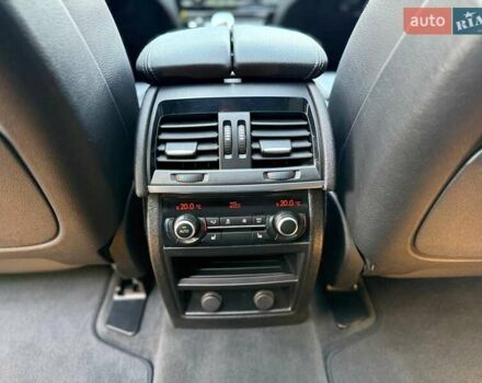 Черный БМВ Х5, объемом двигателя 3 л и пробегом 185 тыс. км за 39900 $, фото 28 на Automoto.ua