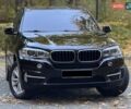 Черный БМВ Х5, объемом двигателя 2 л и пробегом 130 тыс. км за 26500 $, фото 1 на Automoto.ua