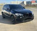Черный БМВ Х5, объемом двигателя 2 л и пробегом 120 тыс. км за 28800 $, фото 1 на Automoto.ua