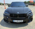 Черный БМВ Х5, объемом двигателя 3 л и пробегом 160 тыс. км за 45000 $, фото 1 на Automoto.ua