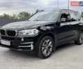 Чорний БМВ Х5, об'ємом двигуна 2 л та пробігом 95 тис. км за 27500 $, фото 1 на Automoto.ua