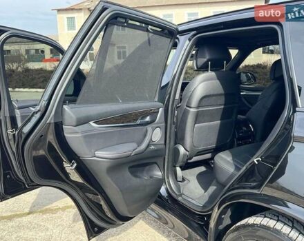 Черный БМВ Х5, объемом двигателя 3 л и пробегом 73 тыс. км за 43000 $, фото 13 на Automoto.ua