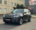 Чорний БМВ Х5, об'ємом двигуна 3 л та пробігом 110 тис. км за 28490 $, фото 1 на Automoto.ua