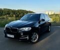 Чорний БМВ Х5, об'ємом двигуна 2 л та пробігом 81 тис. км за 31500 $, фото 1 на Automoto.ua