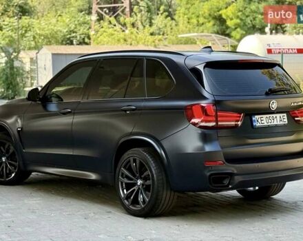 Черный БМВ Х5, объемом двигателя 3 л и пробегом 185 тыс. км за 39900 $, фото 1 на Automoto.ua