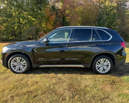 Чорний БМВ Х5, об'ємом двигуна 3 л та пробігом 64 тис. км за 17000 $, фото 3 на Automoto.ua