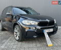 Чорний БМВ Х5, об'ємом двигуна 2 л та пробігом 230 тис. км за 32900 $, фото 1 на Automoto.ua