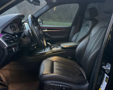 Черный БМВ Х5, объемом двигателя 3 л и пробегом 73 тыс. км за 45500 $, фото 8 на Automoto.ua