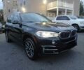 Черный БМВ Х5, объемом двигателя 3 л и пробегом 62 тыс. км за 7506 $, фото 1 на Automoto.ua
