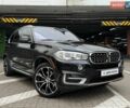 Чорний БМВ Х5, об'ємом двигуна 2 л та пробігом 98 тис. км за 30990 $, фото 1 на Automoto.ua