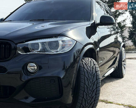 Черный БМВ Х5, объемом двигателя 3 л и пробегом 73 тыс. км за 43000 $, фото 1 на Automoto.ua