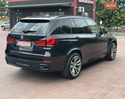 Черный БМВ Х5, объемом двигателя 3 л и пробегом 275 тыс. км за 35900 $, фото 81 на Automoto.ua