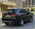 Черный БМВ Х5, объемом двигателя 2 л и пробегом 143 тыс. км за 34500 $, фото 1 на Automoto.ua