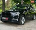Чорний БМВ Х5, об'ємом двигуна 2 л та пробігом 125 тис. км за 31290 $, фото 1 на Automoto.ua