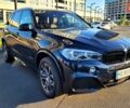 Черный БМВ Х5, объемом двигателя 2 л и пробегом 99 тыс. км за 29500 $, фото 1 на Automoto.ua