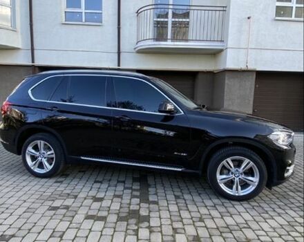Чорний БМВ Х5, об'ємом двигуна 3 л та пробігом 137 тис. км за 29999 $, фото 4 на Automoto.ua