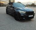 Черный БМВ Х5, объемом двигателя 3 л и пробегом 103 тыс. км за 57000 $, фото 1 на Automoto.ua