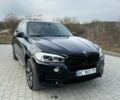 Черный БМВ Х5, объемом двигателя 2 л и пробегом 100 тыс. км за 28700 $, фото 1 на Automoto.ua