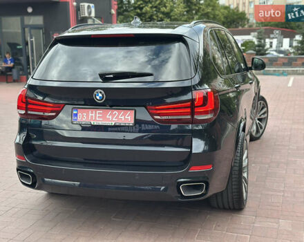 Черный БМВ Х5, объемом двигателя 3 л и пробегом 275 тыс. км за 35900 $, фото 59 на Automoto.ua