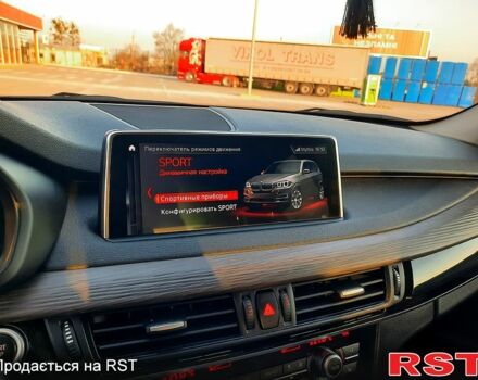 Черный БМВ Х5, объемом двигателя 2 л и пробегом 155 тыс. км за 26500 $, фото 4 на Automoto.ua