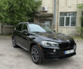 Черный БМВ Х5, объемом двигателя 2 л и пробегом 94 тыс. км за 31700 $, фото 1 на Automoto.ua