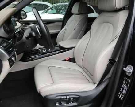 Чорний БМВ Х5, об'ємом двигуна 3 л та пробігом 117 тис. км за 25000 $, фото 5 на Automoto.ua