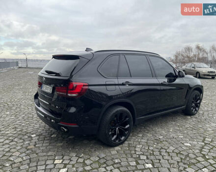 Черный БМВ Х5, объемом двигателя 2.5 л и пробегом 118 тыс. км за 34500 $, фото 3 на Automoto.ua