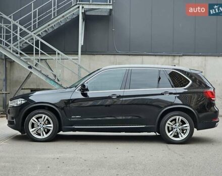 Черный БМВ Х5, объемом двигателя 2 л и пробегом 144 тыс. км за 33999 $, фото 1 на Automoto.ua