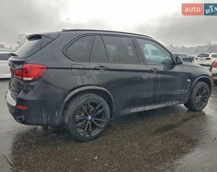 Черный БМВ Х5, объемом двигателя 3 л и пробегом 133 тыс. км за 9500 $, фото 2 на Automoto.ua