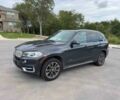 Черный БМВ Х5, объемом двигателя 3 л и пробегом 34 тыс. км за 35200 $, фото 1 на Automoto.ua