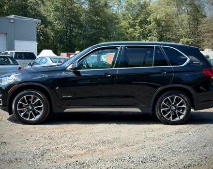 Черный БМВ Х5, объемом двигателя 2 л и пробегом 49 тыс. км за 15700 $, фото 3 на Automoto.ua