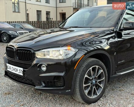 Черный БМВ Х5, объемом двигателя 2 л и пробегом 100 тыс. км за 29900 $, фото 2 на Automoto.ua