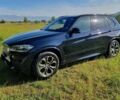 Чорний БМВ Х5, об'ємом двигуна 3 л та пробігом 117 тис. км за 25000 $, фото 2 на Automoto.ua