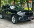 Чорний БМВ Х5, об'ємом двигуна 2 л та пробігом 125 тис. км за 31290 $, фото 2 на Automoto.ua