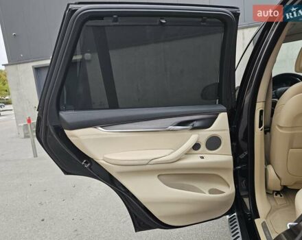 Черный БМВ Х5, объемом двигателя 2 л и пробегом 144 тыс. км за 33999 $, фото 72 на Automoto.ua