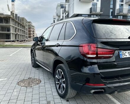 Черный БМВ Х5, объемом двигателя 2 л и пробегом 100 тыс. км за 28700 $, фото 1 на Automoto.ua