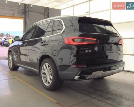 Черный БМВ Х5, объемом двигателя 3 л и пробегом 143 тыс. км за 29400 $, фото 1 на Automoto.ua