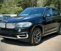 Черный БМВ Х5, объемом двигателя 2 л и пробегом 49 тыс. км за 15700 $, фото 2 на Automoto.ua