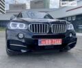 Чорний БМВ Х5, об'ємом двигуна 3 л та пробігом 130 тис. км за 59900 $, фото 1 на Automoto.ua