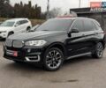 Черный БМВ Х5, объемом двигателя 3 л и пробегом 84 тыс. км за 27490 $, фото 1 на Automoto.ua